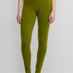 woman wearing green cashmere leggings.